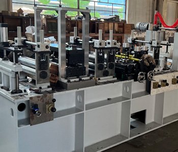 Non ferrous metal strip trimming (deburring) unit